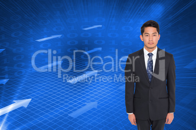 Composite image of stern businessman looking at camera