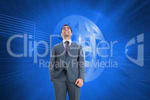 Composite image of smiling businessman standing