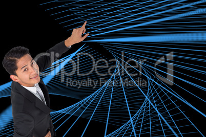 Composite image of smiling asian businessman pointing