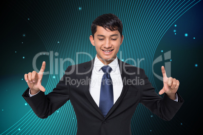 Composite image of smiling businessman holding