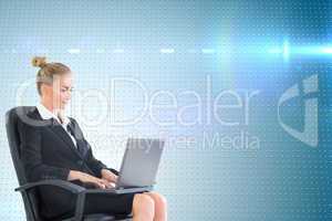 Composite image of businesswoman sitting on swivel chair with la