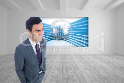 Composite image of smiling businessman standing