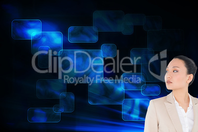 Composite image of unsmiling asian businesswoman