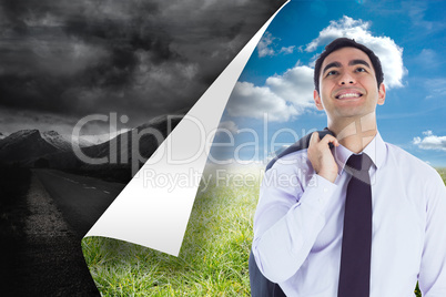 Composite image of smiling businessman standing