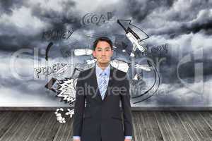 Composite image of serious asian businessman