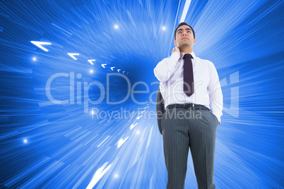 Composite image of unsmiling businessman standing