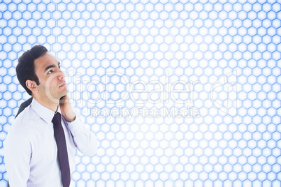 Composite image of unsmiling businessman standing Composite image of unsmiling businessman standing