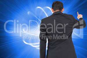 Composite image of asian businessman pointing