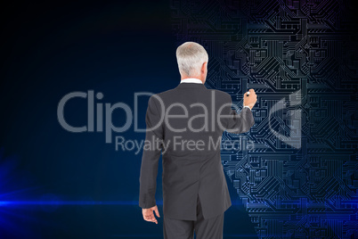 Composite image of rear view of businessman standing and writing