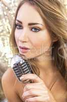 female woman singing with vintage microphone