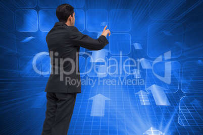 Composite image of thoughtful asian businessman pointing