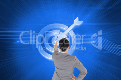 Composite image of asian businesswoman pointing