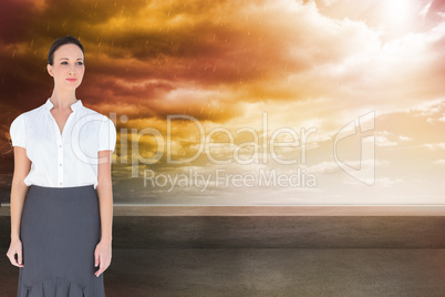 Composite image of content businesswoman posing