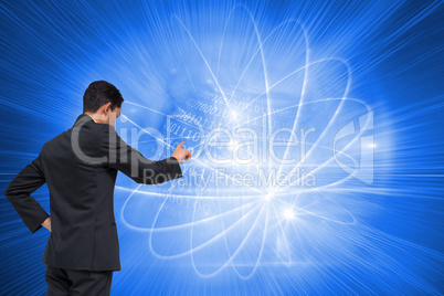 Composite image of unsmiling asian businessman pointing