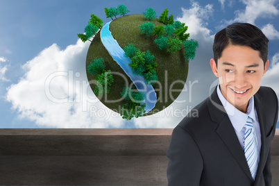 Composite image of smiling asian businessman