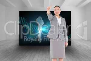 Composite image of smiling asian businesswoman pointing