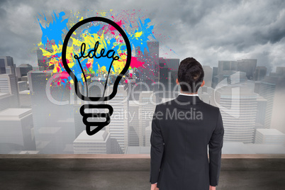 Composite image of businessman turning his back to camera