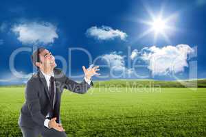 Composite image of stressed businessman catching
