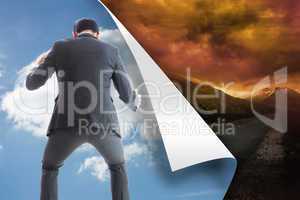 Composite image of businessman catching