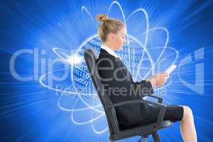 Composite image of businesswoman sitting on swivel chair with ta