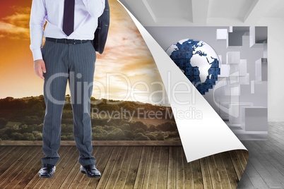 Composite image of smiling businessman standing