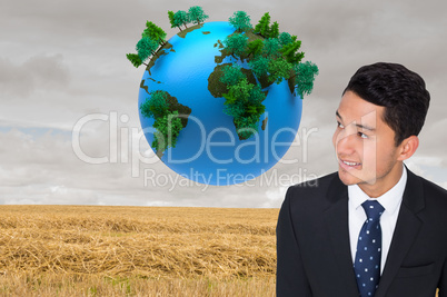 Composite image of smiling asian businessman