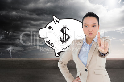 Composite image of unsmiling asian businesswoman pointing