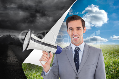 Composite image of smiling businessman holding a megaphone