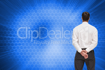 Composite image of businessman turning his back to camera