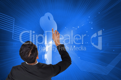 Composite image of asian businessman pointing