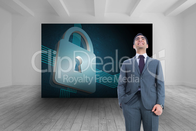 Composite image of smiling businessman standing