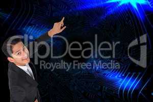 Composite image of smiling asian businessman pointing