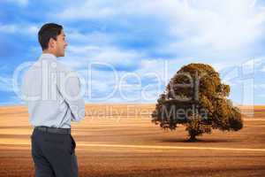 Composite image of smiling asian businessman