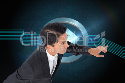 Composite image of unsmiling asian businessman pointing