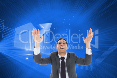 Composite image of excited businessman with arms raised