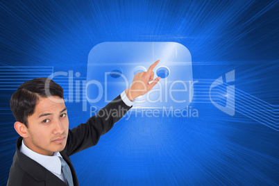 Composite image of unsmiling asian businessman pointing