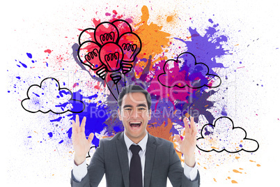 Composite image of excited businessman with arms raised