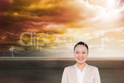 Composite image of smiling asian businesswoman