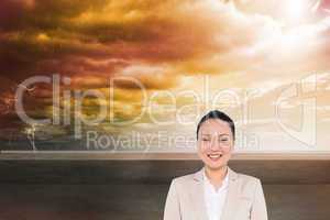 Composite image of smiling asian businesswoman