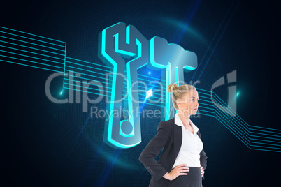 Composite image of businesswoman standing with hands on hips