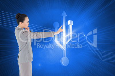 Composite image of thoughtful asian businesswoman pointing