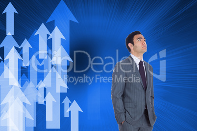 Composite image of unsmiling businessman standing