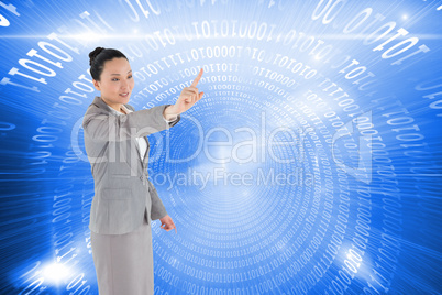 Composite image of smiling asian businesswoman pointing