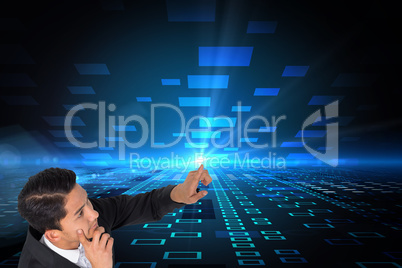 Composite image of thoughtful asian businessman pointing