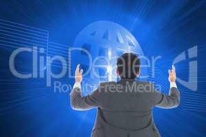 Composite image of businessman with arms raised