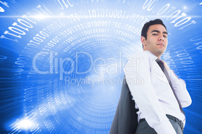 Composite image of unsmiling businessman standing Composite image of unsmiling businessman standing