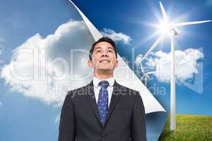 Composite image of sky background over turbine background