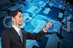 Composite image of smiling asian businessman pointing