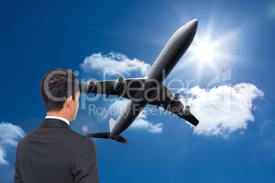 Composite image of 3d plane flying in the sky