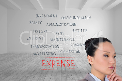 Composite image of thoughtful asian businesswoman pointing